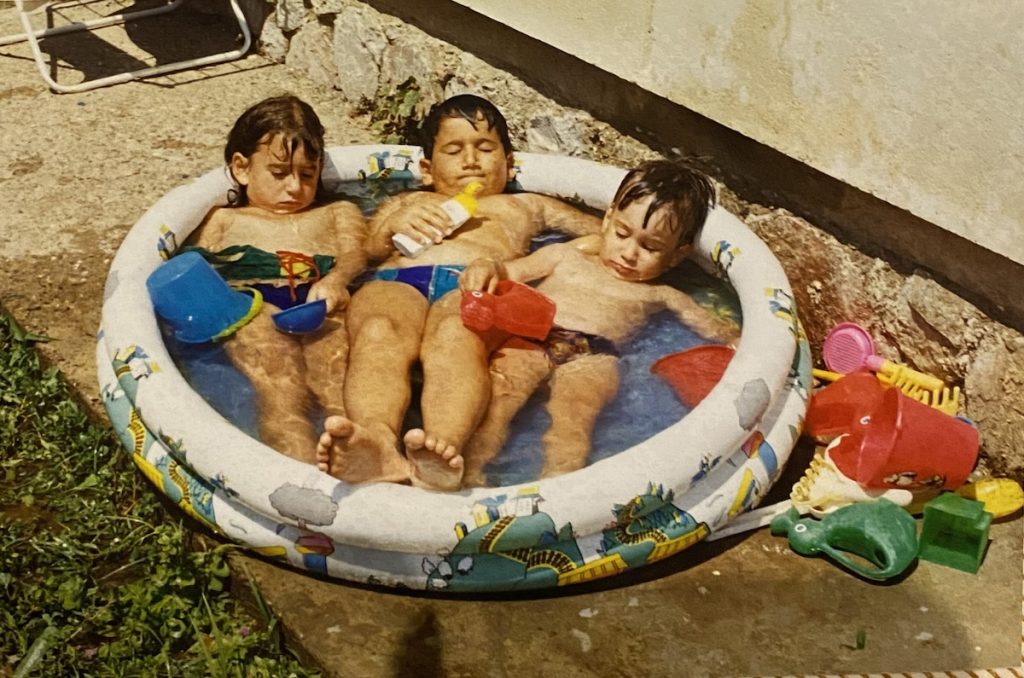 The author and her cousins soaking at grandma’s summer house. Photo courtesy of the author. 