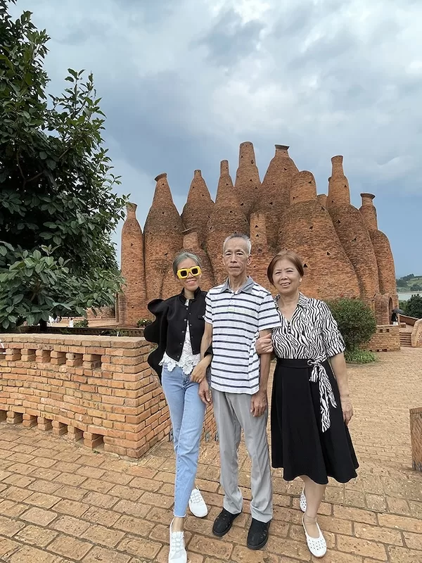 Stella with her parents in Yunnan, China