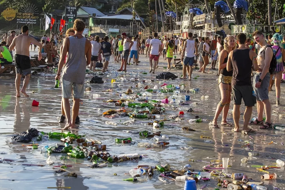 Haad Rin beach, Thailand, after a raucous full moon party on Koh Phangan island. Photo courtesy of iStock/intek1