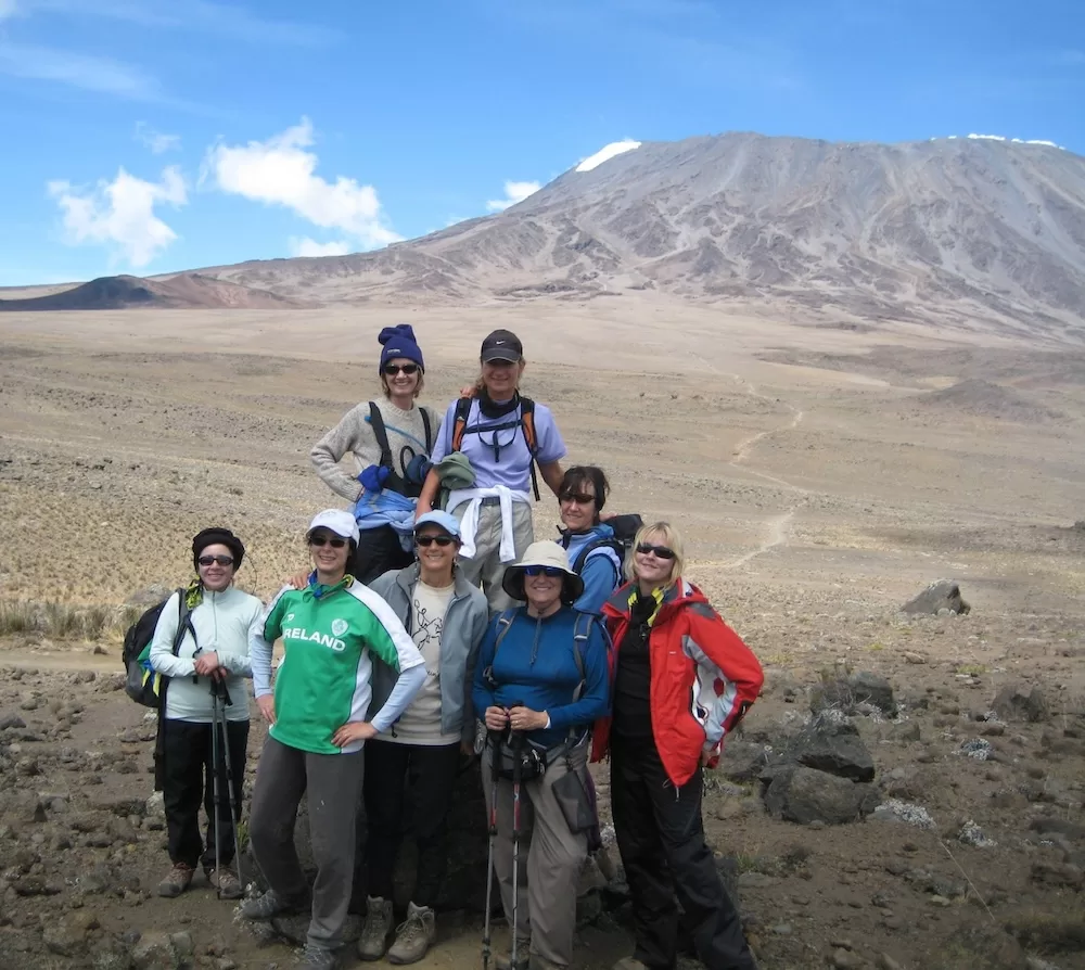 The group poses before the final summit.