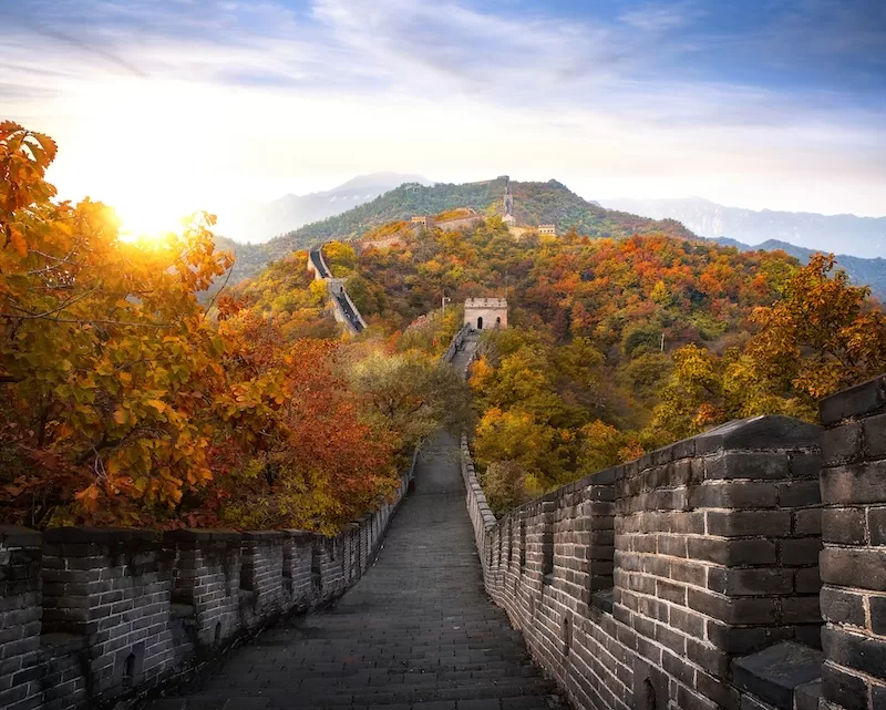 The Great Wall of China in Autumn at sunset.