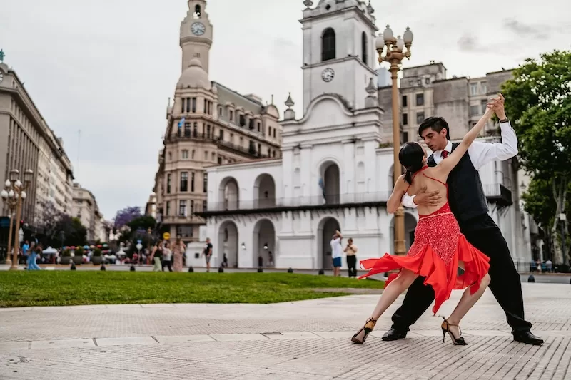 A young couple dances the tango on Plaza de Mayo square in Buenos Aires, Argentina. Photo courtesy of iStock/urbazon.