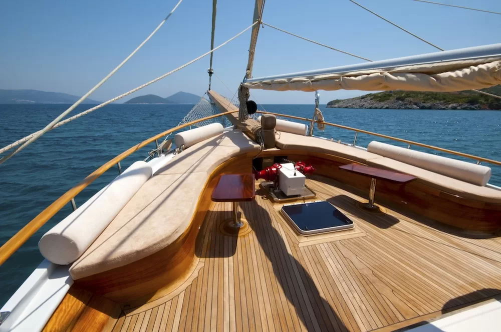 Teak wood on the bow of a luxury wooden yacht. Photo courtesy of iStock/SanerG