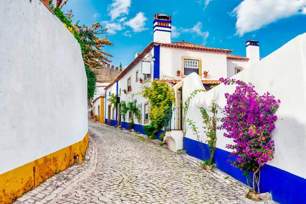 A street in the medieval village of Óbidos, Portugal. 