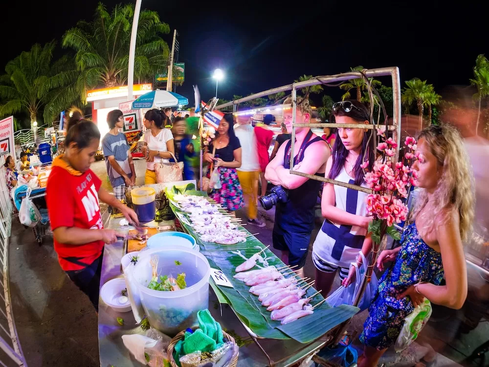 A vibrant street scene in Pattaya, Thailand.