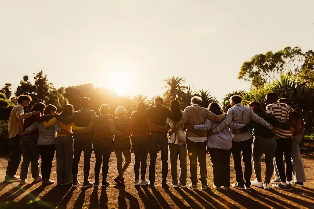 A group of people gathering in support of community in Spain. 